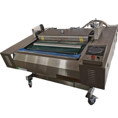 China Continuous Type Vacuum Sealing Machine Food Belt Packing Machine for sale