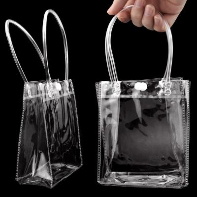 China Clear Barrier PVC Gift Bags With Handles Small Clear Gift Envelope Bags Clear Tote Reusable Shopping Bags With Handle for sale