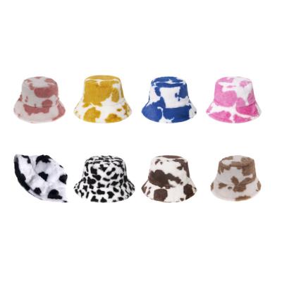 China Image Hot Selling New Design Raw Cow Printed Hairy Faux Fur Bucket Hat Hats For Women Winter for sale