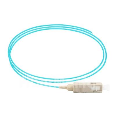 China SC/UPC 0,9 mm Simplex Multimode OM3 Glasvezel Pigtail Aqua Jacket Te koop