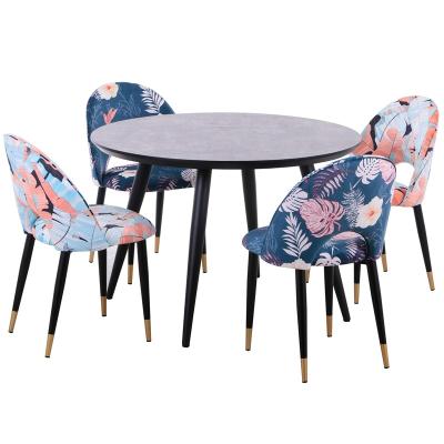 China Stable Modern Luxury MDF Dining Tables 4 Seater Round Dining Table Set With Fabric Chair for sale