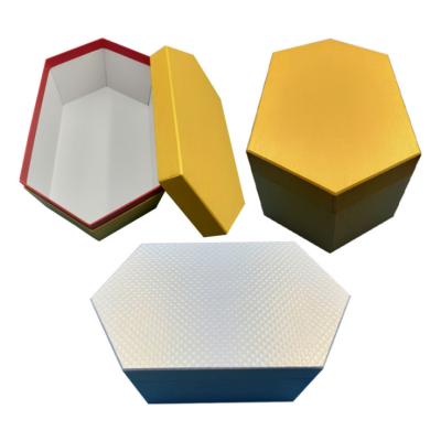 China Recycled Unique Materials Shape Hexagon Box For Cloth Packing Fin Lid for sale