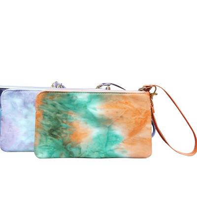 China Lady Wholesale and Custom Tie Dye Wristlet Pouch Makeup Bags Storage Bags Dye Tie Bags for sale