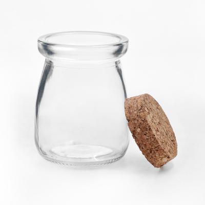 China Wholesale Hot Selling 100ml Recyclable Food Storage Milk Yogurt Jars Pudding Glass Bottles With Cork Lids for sale