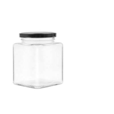 China Hot Selling 500ml Clear Empty Square Food Glass Jar For Food Honey Jar With Black Metal Lid for sale