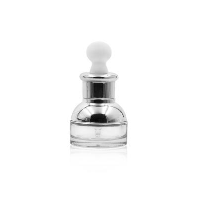 China 30ML Cosmetic Wholesale High Quality Eye Cream Essence Facial Serum Shoulder Set Dropper Essential Oil Glass Bottle With Silver Cap for sale