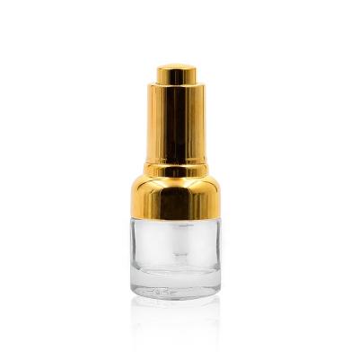 China 25ML Cosmetic Customize High Quality Clear Essence Facial Serum Essential Oil Glass Cosmetic Packaging Bottle With Gold Pressure Dropper for sale