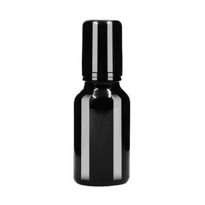 China Personal Care 15ml Round Roll Black On Essential Oil Perfume Eye Cream Glass Bottle With Roller And Foil Cap for sale