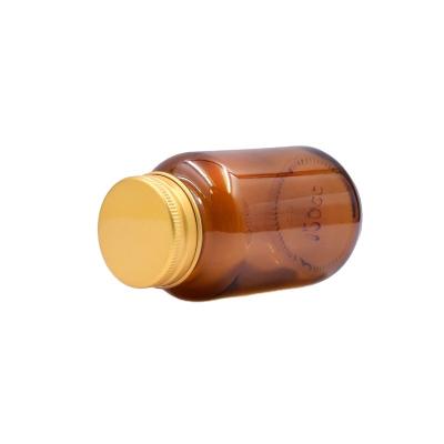 China Eco-friendly Recyclable Empty Amber Round Storage RTS 120ml Glass Pill Bottle Food Pill Bottle With Screw Lid for sale