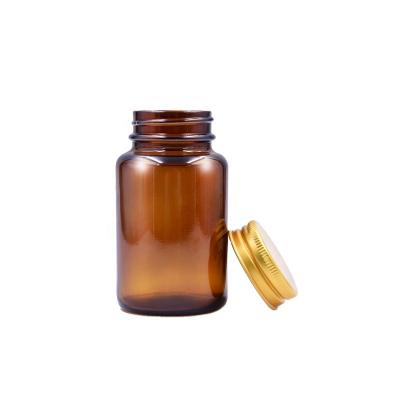 China 100ml Eco-friendly Recyclable In Stock RTS Amber Capsule Storage Glass Pill Bottle With Aluminum Screw Lid for sale