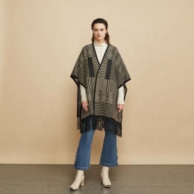 China 2022 Anti-wrinkle plaid knitted cardigan women long open front cap poncho tassel sweater wholesale wrap shawls for sale