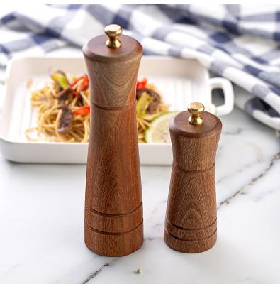 China Viable Manual Kitchen Ebony Pepper Mill Black Ceramic Core Home Kitchen Grinder for sale