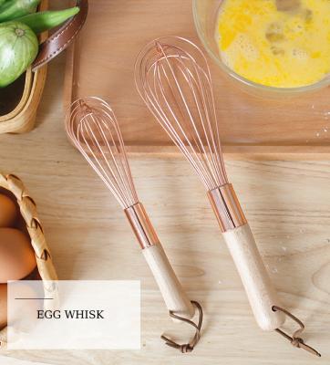 China Ine Egg Tools Rose Gold Sustainable Beater With Wooden Handle Egg Beaters Beat Items for sale