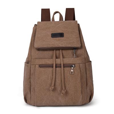 China Male Student Waterproof Female Satchel Fashion Backpack Canvas Lady Bag Retro Canvas Backpack for sale