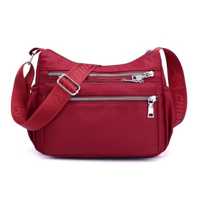 China Waterproof Fashion Waterproof Cross - Bag Ladies Soft Solid Packing Nylon Body Messenger Women Shoulder Bag for sale