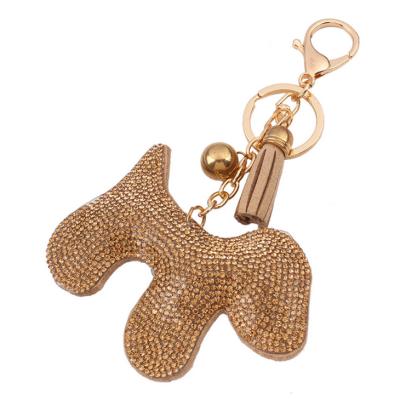 China Eco-friendly Design 18K Gold Alloy Faux Stone Dog Cartoon Use Decoration Handbag Fashion Leather Key Chain With Tassel for sale