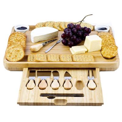 China Excellent Cheese Stocked Tray Bamboo Charcuterie Cheese Board and Knife Set Large Wooden Cheese Board for sale