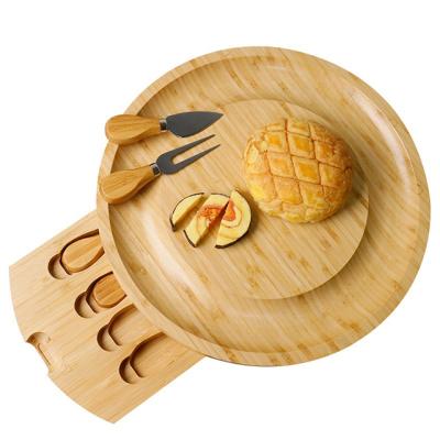 China Sustainable cheese board set with 4knife hot sale newstyle on Amazon the round cheese board for sale