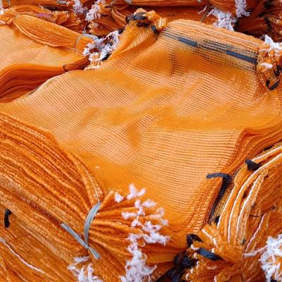 China Latvia America Estonia TEST Group Recyclable UV Firewood Tubular Orange Color Gauze Mesh Bag 43*60 42*60 for sale