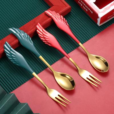 China Viable Popular Christmas Style Teaspoon Dessert Fork Stainless Steel Mini Spoon Fork Set With Wings Design for sale