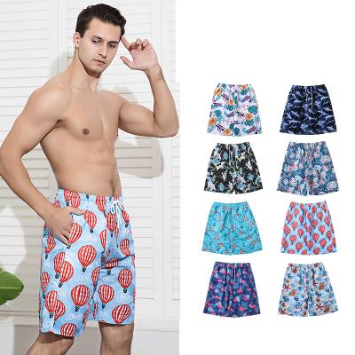 China 2022 breathable new peachskin quick dry beach shorts mens vacation casual loose shorts plus size 100% polyester print panties for sale