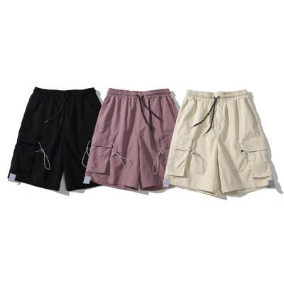 China OEM fashion brand pocket solid color cargo shorts men's CI trend leisure pants loose oversize rayon soft fabric 100% for sale