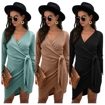 China Front Twist Fitted Wrap Dress Anti-wrinkle Long Sleeve Autumn And Spring Cutout Solid Skirt for sale