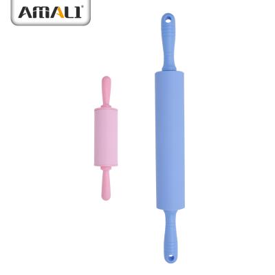 China Kitchen Silicone Baking Tools Traditional Accessories Silicone Rolling Pin With Plastic Handle for sale