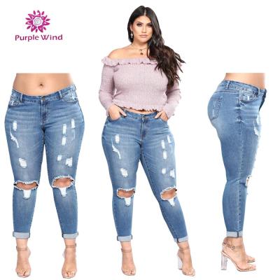 China Lot Stock Plus Size Stretch Fabric Plus Size Denim Womens Ripped Jeans for sale