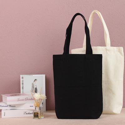 China Custom Canvas Tote Bag Drawstring Bag Fabric Reusable High Standard Bags Drawstring Packaging Gift for sale