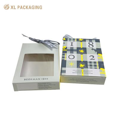 China Lip Card Box Custom Design For Lipstick Packaging Bow Attaching Cardboard Box With PVC Film Window Folding Card Box for sale