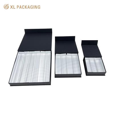 China Luxury Paperboard Chocolate Paper Box Black Magnetic Gift Box With Paper Dividers for sale