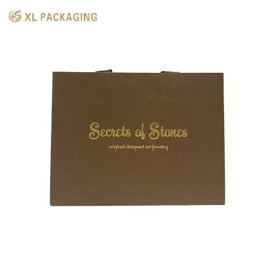 China Gift Bags Custom Logo Printed art paper Packaging Brown ribbon Gift Craft Shopping Paper Bag With Handles for sale