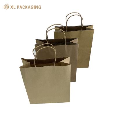 China Custom Printed Recycled Kraft Paper Shopping Bag Boutique Style With Your Own Logo for sale