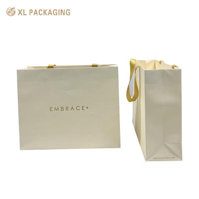 China Warm Color Paper Packaging Bags Eco friendly For Exhibition Promotion Events for sale