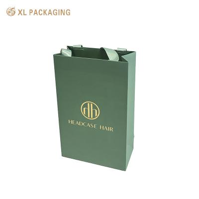 China Full Color Printing Green Color Shipping Bag Custom Logo Paper Bag with Handle Gift Packaging Bag for sale