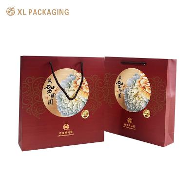 China Wholesale Printed Printed Paper Bags Custom Logo Luxury Shopping Gift Paper Bag With Handle for sale