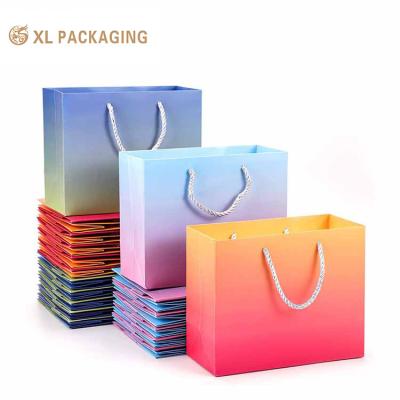 China Custom Packaging Bag Luxury Matte Gift Shopping Paper Bag With Logo For Clothing Jewelry Wine for sale