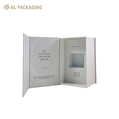 China Cosmetic Paper Box Kraft Paper Gift Box Black Gold Foil Magnet Cosmetic Box Packaging With EVA Inserts for sale