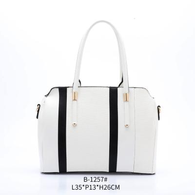 China Fashion Guangzhou Fashion Women's Handbag Large Capacity Temperament Bag Pattern Leisure Splicing Bag for sale