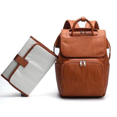 China Amazon factory direct mum brown leather baby diaper bags vegan anti-theft bag backpack baby changing bag for sale