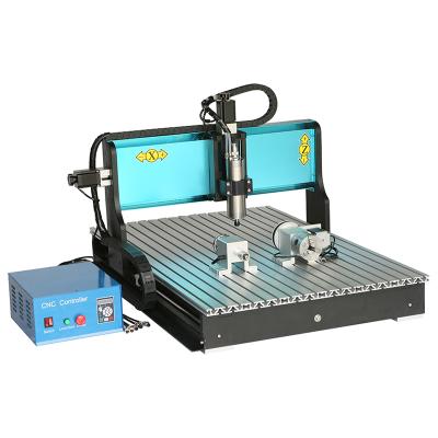 China Hotels Desktop 6090 CNC Engraving Router 600 x 900 4 Axis Rotary Axis CNC Milling Machine for sale