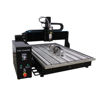 China Mini Metal Milling Drilling Machine 4 Axis CNC Router 6090 Metal Materials Glass Cutting Table for sale