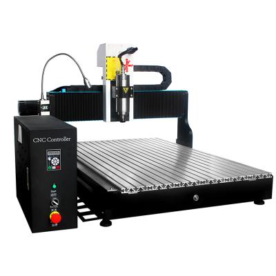 China Garment Shops High Speed ​​Precision Cutting Engraving Rotary CNC Router Table 6090F 4 Axis CNC Wood Carving Machine for sale