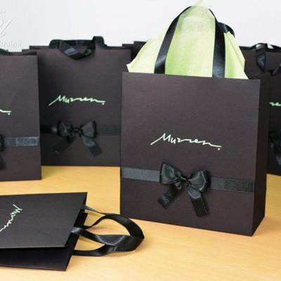 China Recyclable Custom Design Black Luxury Jewelry Cosmetic Gift Large Paper Bag With Iridescent And Flower for sale