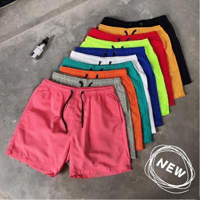 China Anti-Wrinkle Wholesale Running Beach Shorts Polyester Mens Shorts Mesh Lining Shorts For Men With Letter Printing For Promotion for sale