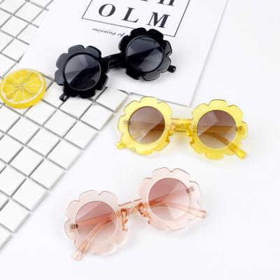 China Fashion Sunglasses Fashion Kids Sunglass UV400 Protection Cute Flower Shape Frame Sunglasses For Girls for sale