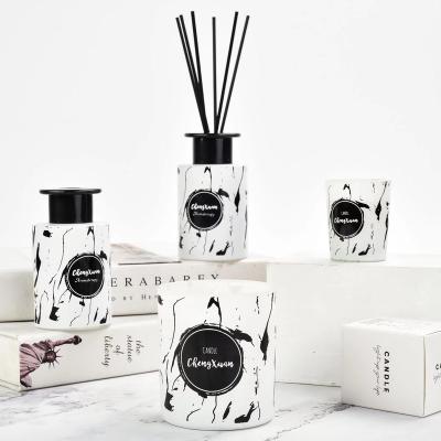 China Birthdays High Grade Home Scent Gift Set Scented Aroma Candle Jar With Glass Bottle 100ml Reed Diffuser for sale