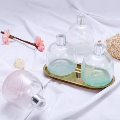 China Fashionable Wholesale Empty Home Private Label Crystal Reed Diffuser Bottle Flower Shape Glass Perfume Bottle With Cap for sale