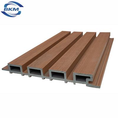 China Modern wood composite panels wpc wall panel co-extrustion interior grooved outer wall cladding for sale